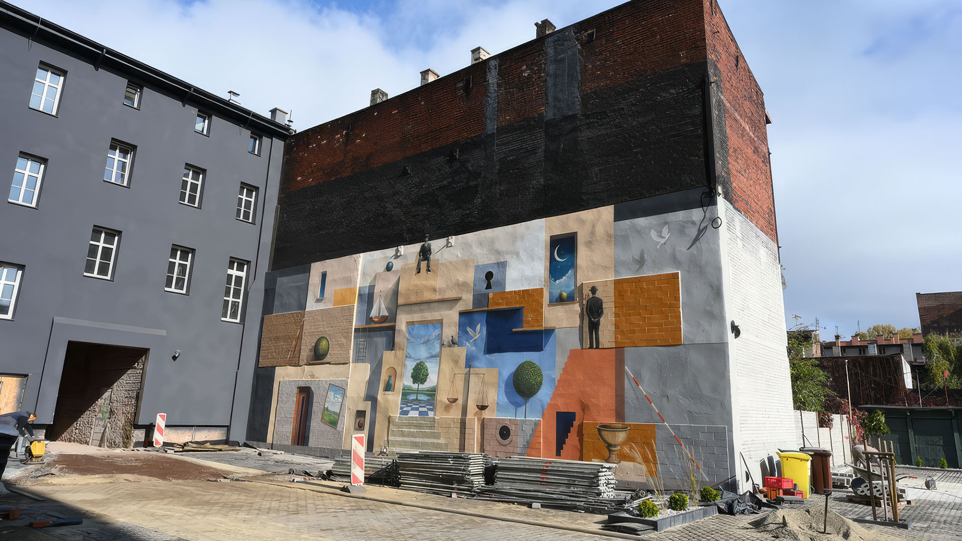 Surrealistyczny mural w podwórzu kamienicy. Nowe malowidło powstało w Bytomiu